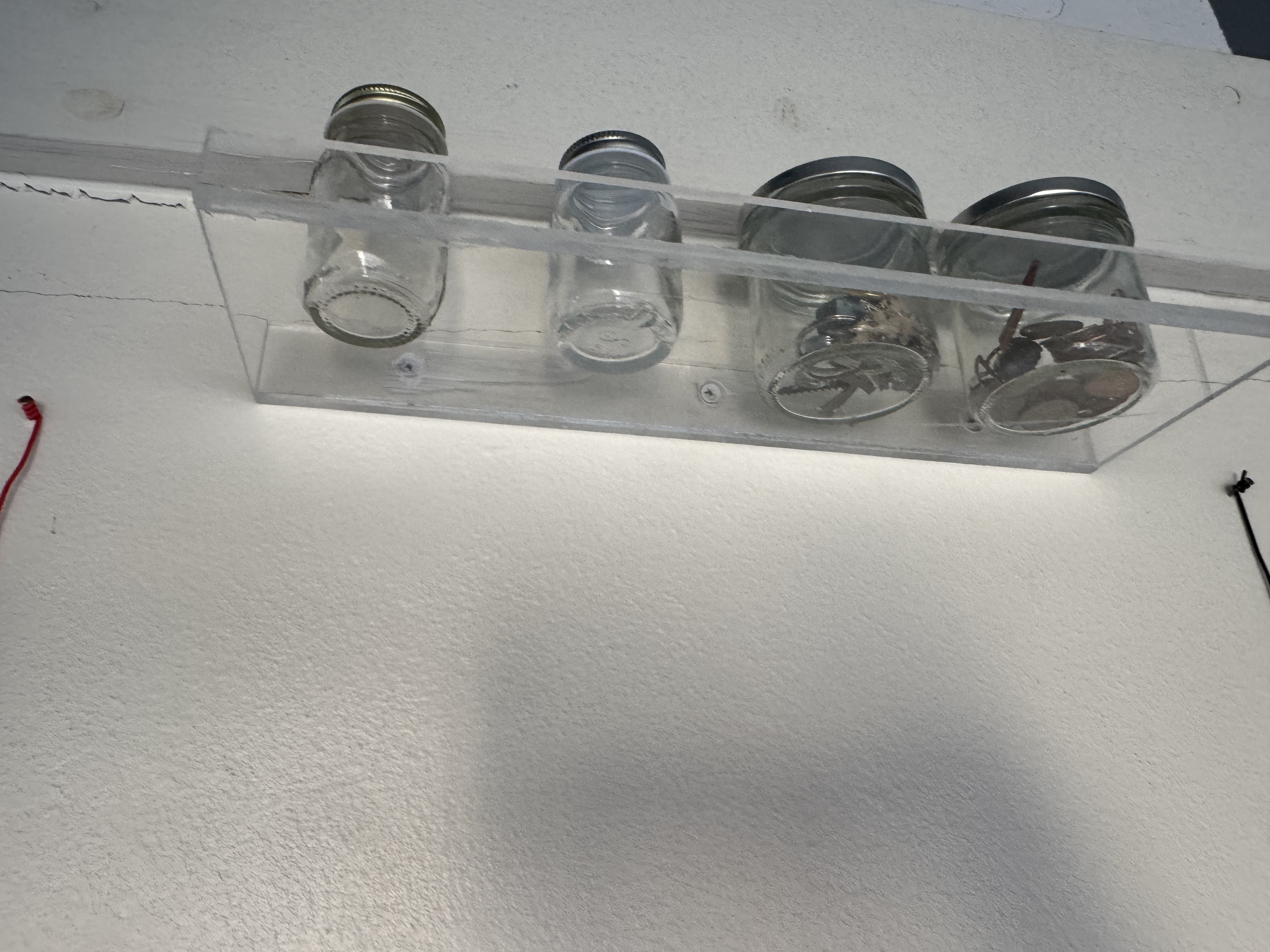 acryilic shelf with glass jars
