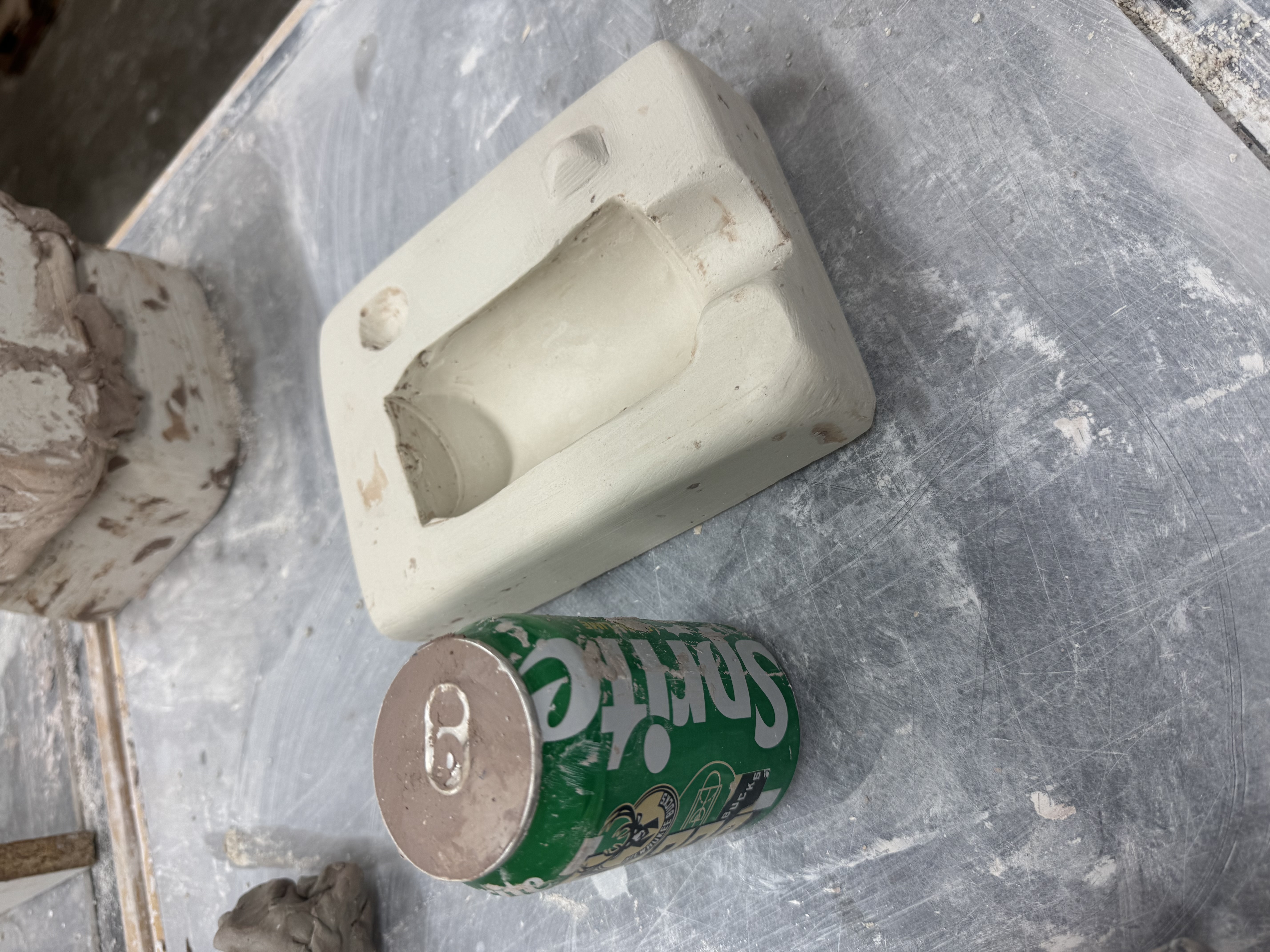plaster mold of soda can